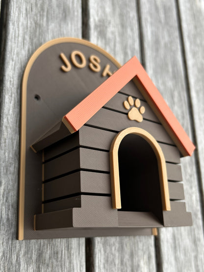 Leash holder in doghouse design